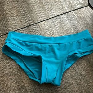 Cleo the hurricane electric teal shorts